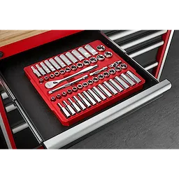 A 56-piece 3/8" Drive SAE and Metric Ratchet and Socket Set, neatly organized in a red tray, is placed inside an open drawer of a tool chest. The set includes various sizes of sockets, a ratchet, and other accessories.