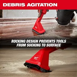 Image showing the AIR-TIP™ Rocking Utility Nozzle w/ Brushes in use. The top part displays the nozzle being used on a dusty wooden floor with the title "DEBRIS AGITATION." Below, a close-up of the nozzle emphasizes its design, with text stating, "ROCKING DESIGN PREVENTS TOOLS FROM SUCKING TO SURFACE."