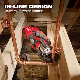 M12 FORCE LOGIC Press Tool Kit w/ ONE-KEY in use on copper pipes within a wooden framework. Text: In-Line Design, Delivers unrivaled access.