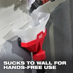 The image shows an AIR-TIP™ Dust Collector in use. It is attached to a wall and collecting dust hands-free. The red and white device has the Milwaukee logo and is actively suctioning dust while a tool works above it. Text on the image reads, "SUCKS TO WALL FOR HANDS-FREE USE."