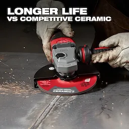 Person grinding metal with an angle grinder equipped with a Bonded Abrasives Grinding disc. Text reads "LONGER LIFE VS COMPETITIVE CERAMIC".