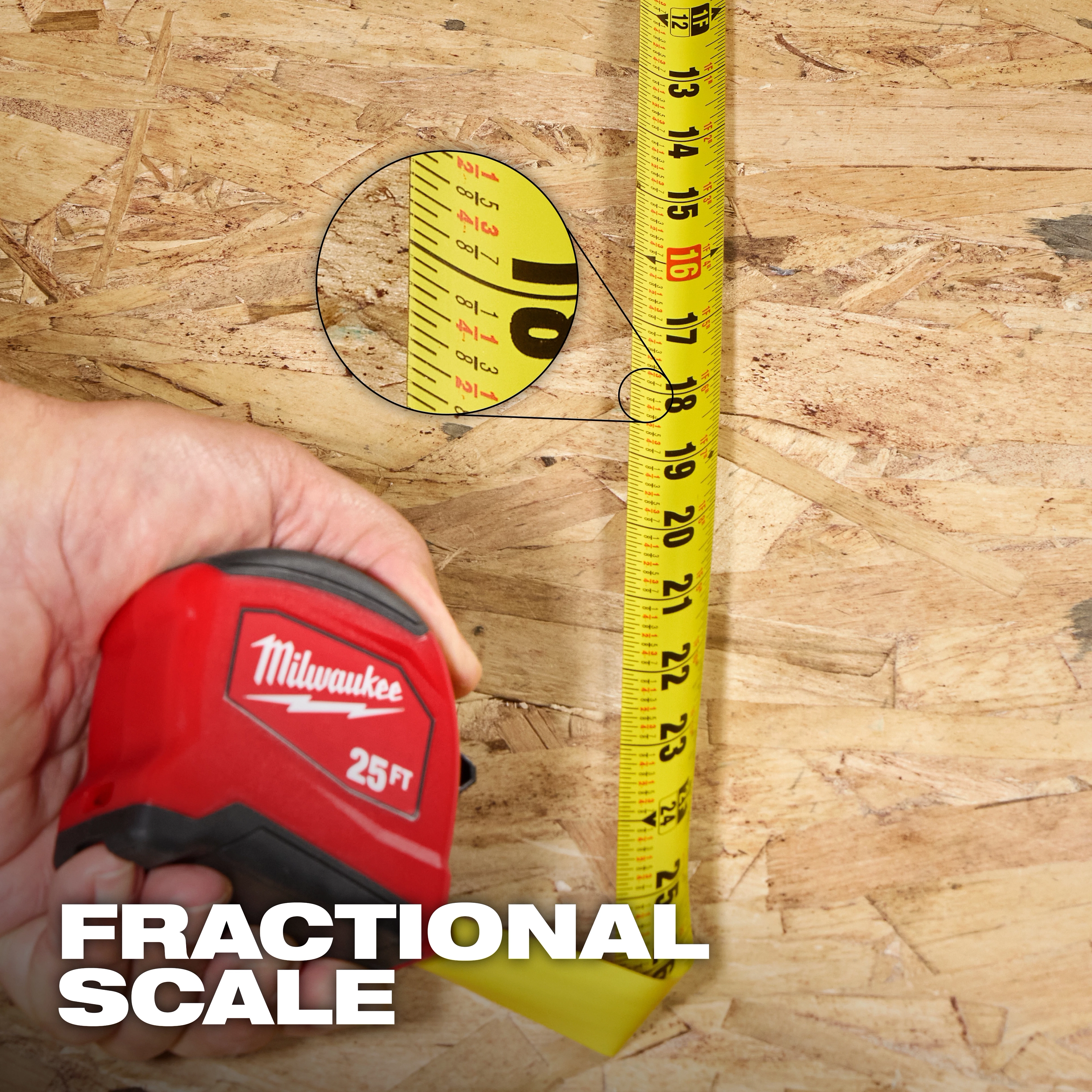Hand holding a 25ft Tape Measure with extended yellow blade showing fractional scale on a wood surface.