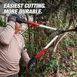 A person uses a 2” Lopper to cut a tree branch. The tool has long handles with red grips and is designed for durability and ease of cutting. The background includes bushes and trees, while the text reads “Easiest cutting. More durable.”