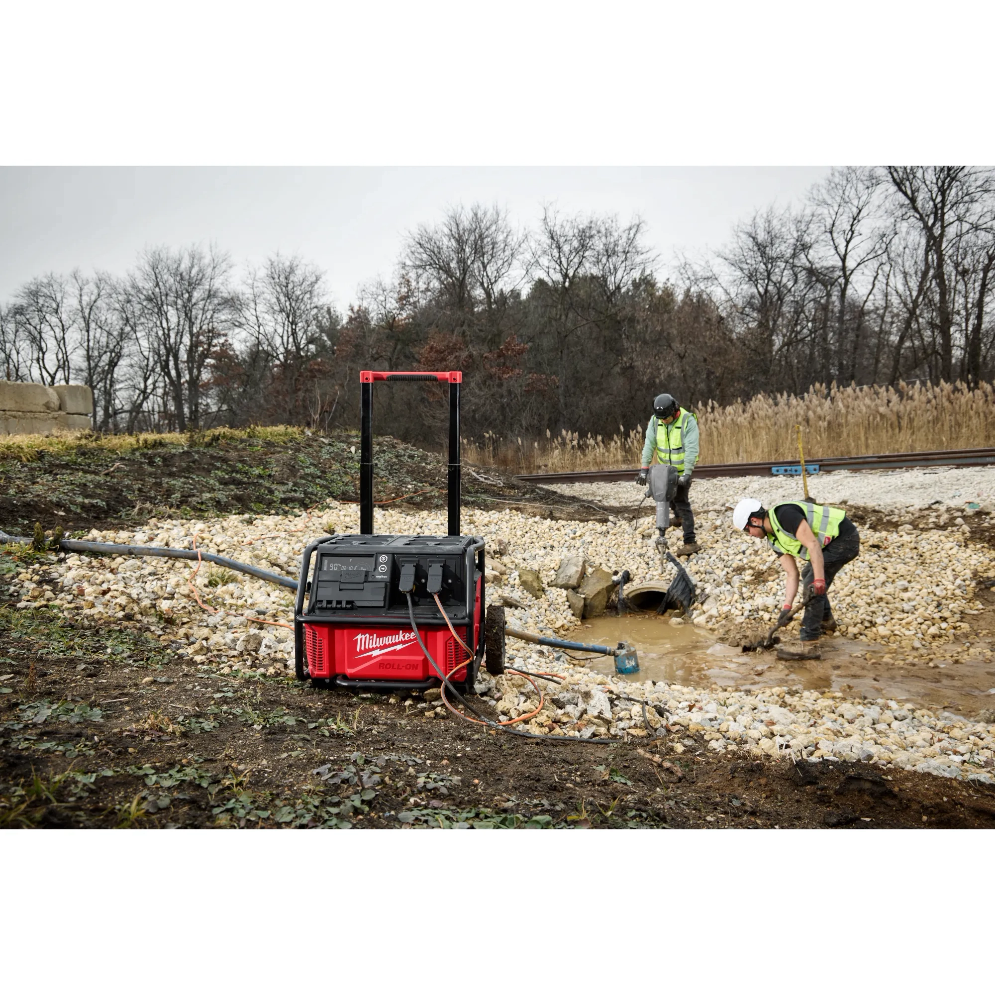 Image of the Milwaukee ROLL-ON 7200W/3600W 2.5KWH Power Supply on a jobsite