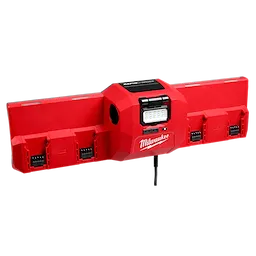 The image shows an M18™ and M12™ Gangbox Rapid Charger with a brown exterior and a row of five red charging ports. The charger is designed for efficient battery charging within a secure box.