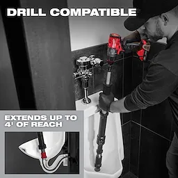 M12 TRAPSNAKE 4' Urinal Auger being used with a power drill in a urinal. Text highlights "DRILL COMPATIBLE" and "EXTENDS UP TO 4' OF REACH."