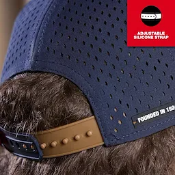 Flat Brim Snapback hat with adjustable silicone strap. Navy blue with perforations.