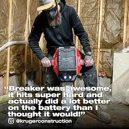 Worker using a Milwaukee breaker tool, with praise caption and Instagram handle, in construction area with exposed walls.