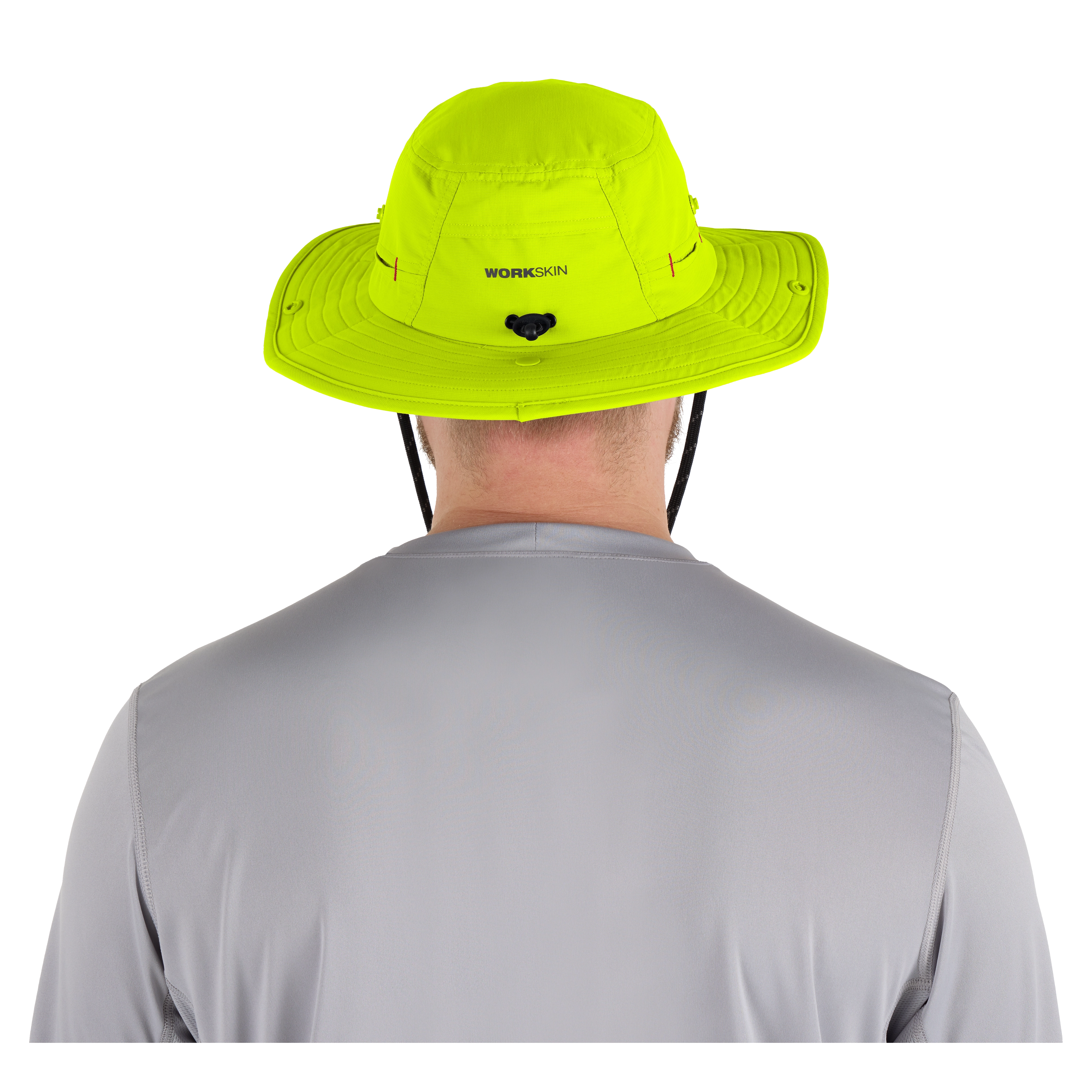 A person wearing a bright yellow WORKSKIN Sunshade Hat seen from the back. The hat features a wide brim and adjustable chin strap, designed for sun protection.