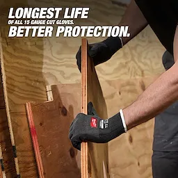 Hands wearing Cut Level 1 Nitrile Dipped Gloves w/ WEAR-DEFENSE Protection lifting a plywood board.