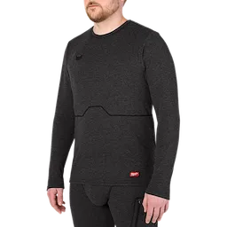 Milwaukee Heated Merino Wool Crew Neck Baselayer in dark gray, featuring long sleeves and a small red logo on the lower left.