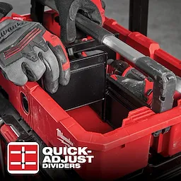 A person wearing gloves adjusts a divider inside a red storage box labeled "App%20Shot%20Overlay" with the text "Quick-Adjust Dividers".