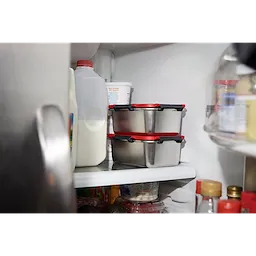 Stainless Steel Containers for M18 Jobsite Lunch Warmer stacked on a refrigerator shelf.