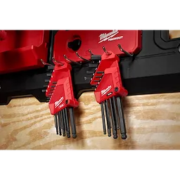 22-Key Ball End L-Key Set - SAE/Metric features red handles and are mounted on a black wall organizer.