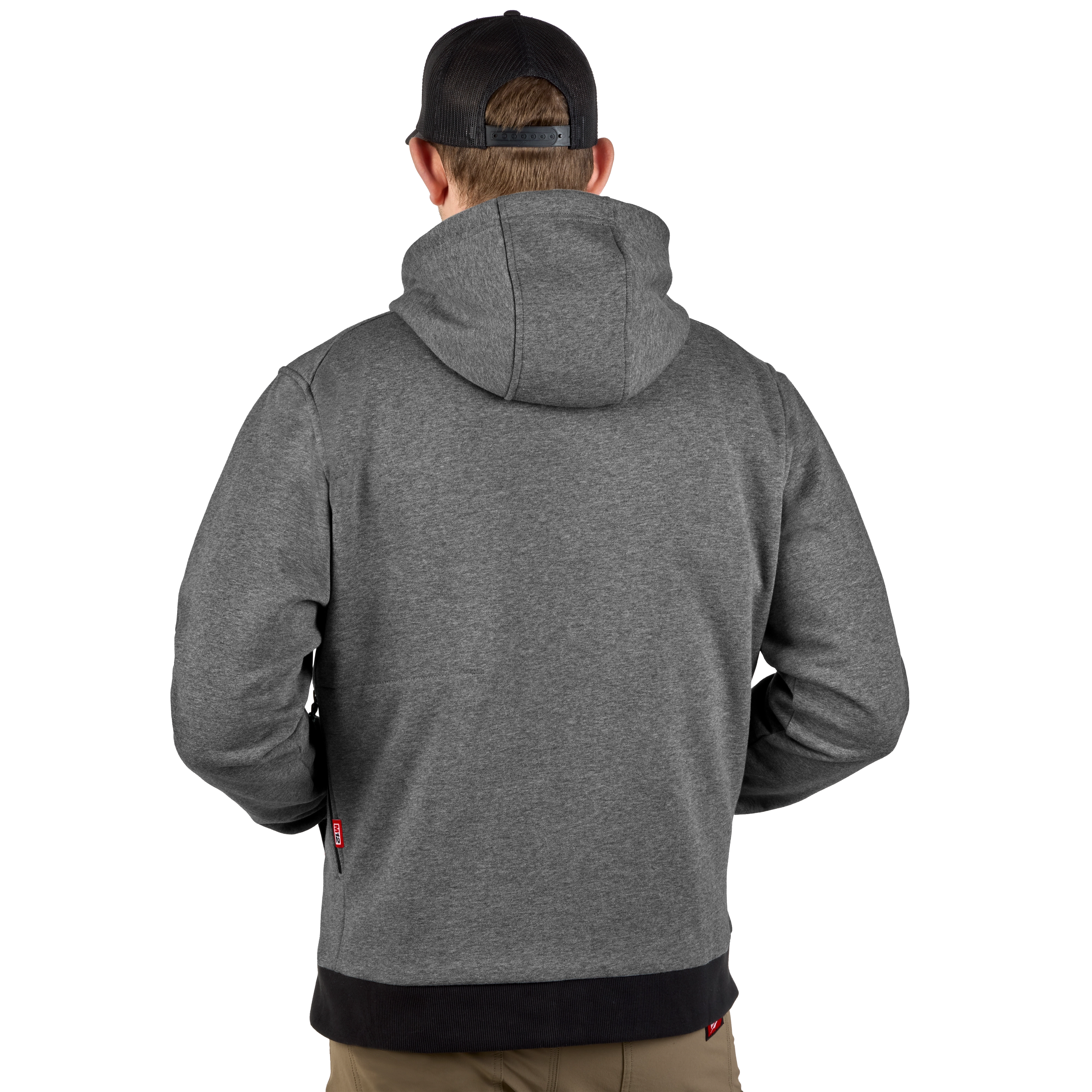 A man wearing a gray M12™ Heated Hoodie is shown from the back. The hoodie has a built-in hood and black accents on the cuffs and waistband. He is also wearing a dark baseball cap and tan pants. The background is plain white.