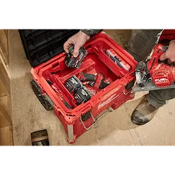 Tool Box Attachment Ready Tray for PACKOUT Tool Boxes loaded with various tools and accessories, with a person removing a tool.