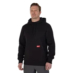 Man wearing the black midweight pullover hoodie
