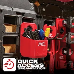 The image displays a PACKOUT Organizer Cup in red, mounted on a storage wall with tools and equipment, promoting quick access organization.