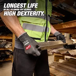Worker wearing Cut Level 4 High Dexterity Nitrile Dipped Gloves w/ WEAR-DEFENSE Protection holding metal beam.