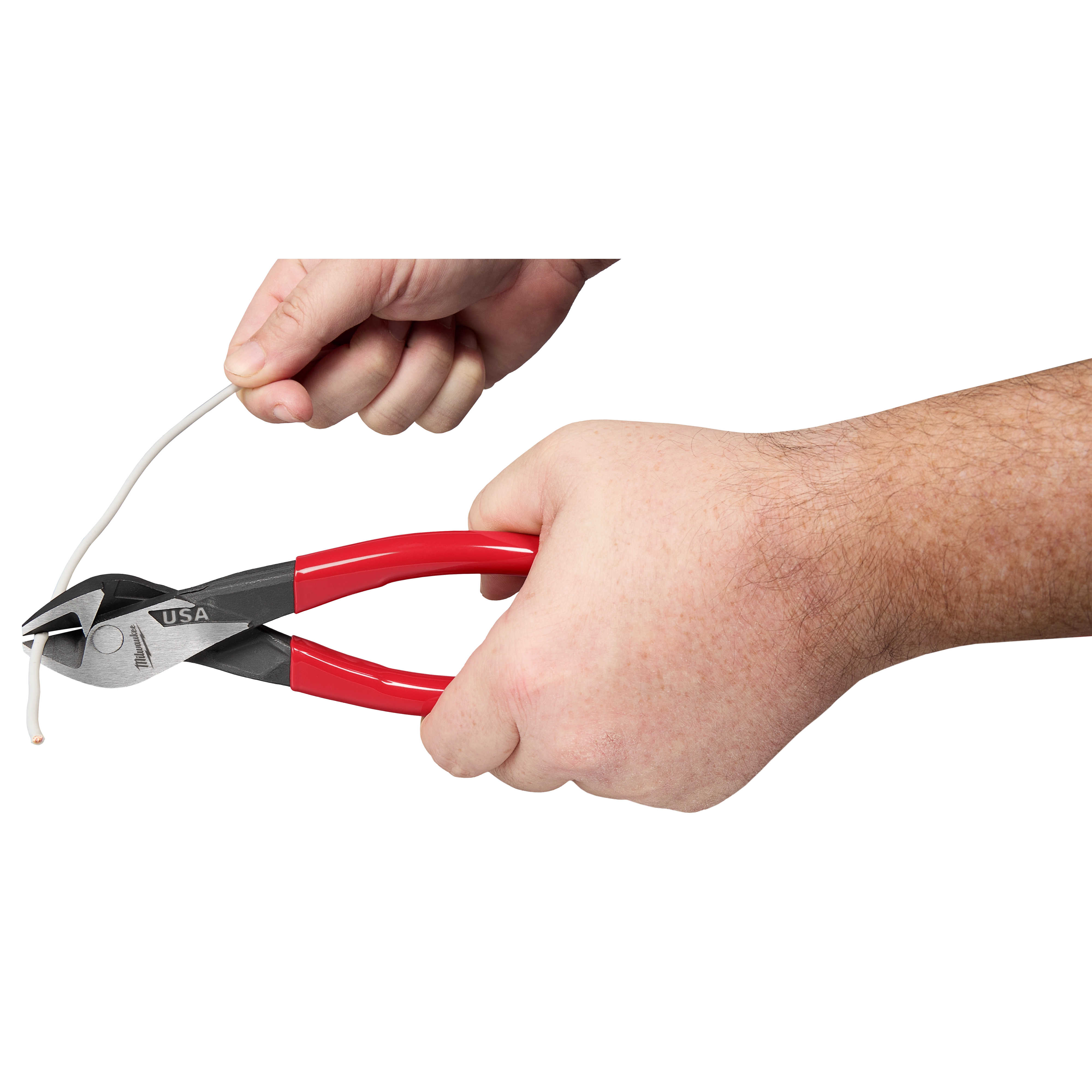 A person is using 8" Angled Head Diagonal Dipped Grip Cutting Pliers (USA) with red handles to cut a piece of white wire. The pliers are angled and have "USA" written on the metal part.