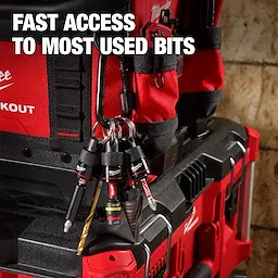 The 5PC Bit Holder with Carabiner from Milwaukee is attached to a red tool bag. The holder securely carries five drill bits, providing quick access. The text on the image reads, "Fast access to most used bits."