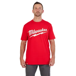HEAVY DUTY T-SHIRT Short-Sleeve - Red with white "Milwaukee" lettering and lightning bolt graphic, worn by a standing person.