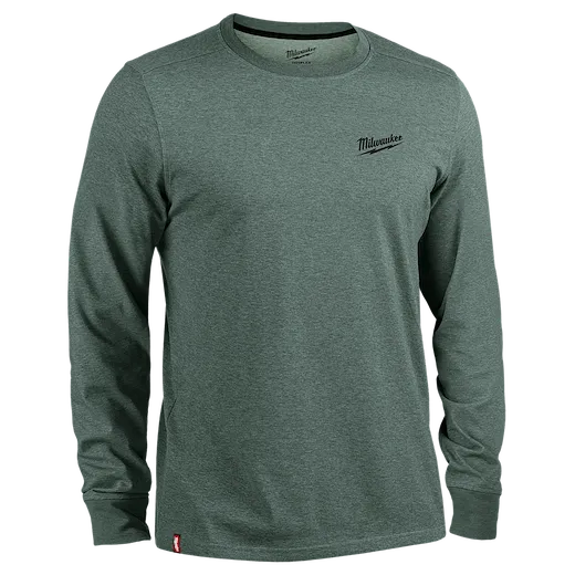 The FREEFLEX™ Hybrid Work Tee - Long Sleeve is a dark gray, crew-neck shirt. It features the Milwaukee logo on the left chest and is designed for durability and flexibility. The shirt has a standard fit with long sleeves and a slightly textured fabric.