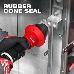 A person uses the AIR-TIP™ Conduit Line Puller Kit with a red and black rubber cone seal. The tool is positioned within a metal conduit enclosure. Text on the image reads "RUBBER CONE SEAL."