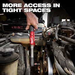 Hand using M12 FUEL 1/2" Extended Reach Ratchet to work on an engine in a tight under-hood space.