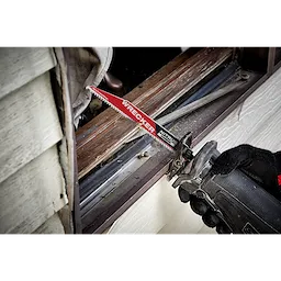 The 9 inch 6TPI Nitrus Wrecker blade cutting through thick material