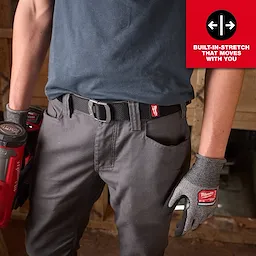 Image of a person wearing the Milwaukee FREEFLEX™ Nylon Webbing 1.5" Belt