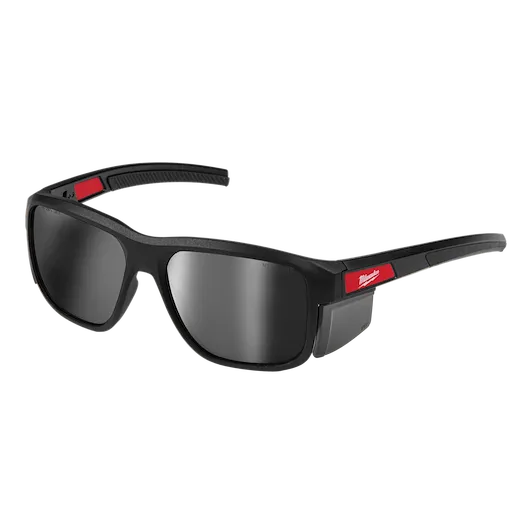 Full Frame Safety Glasses with Removable Side Shields feature silver mirrored, anti-scratch lenses. The black frames include red accents and branding. Designed for eye protection in various environments, these glasses combine durability and comfort with a modern aesthetic.