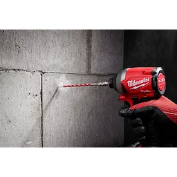 Worker using the Hammer Drill Bit Conrete Screw Installation tool